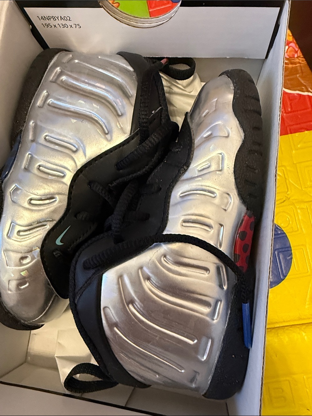 Nike Kids Metallic Silver and Black Foam Style Sneakers with Accent Detail